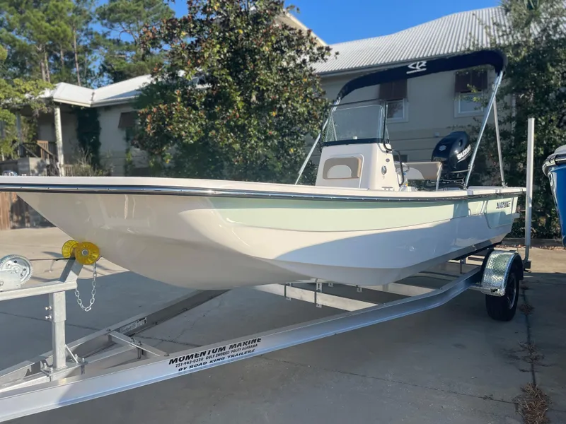 The Image of 2024 Sundance B20CCR boat on trailer in driveway. - 0