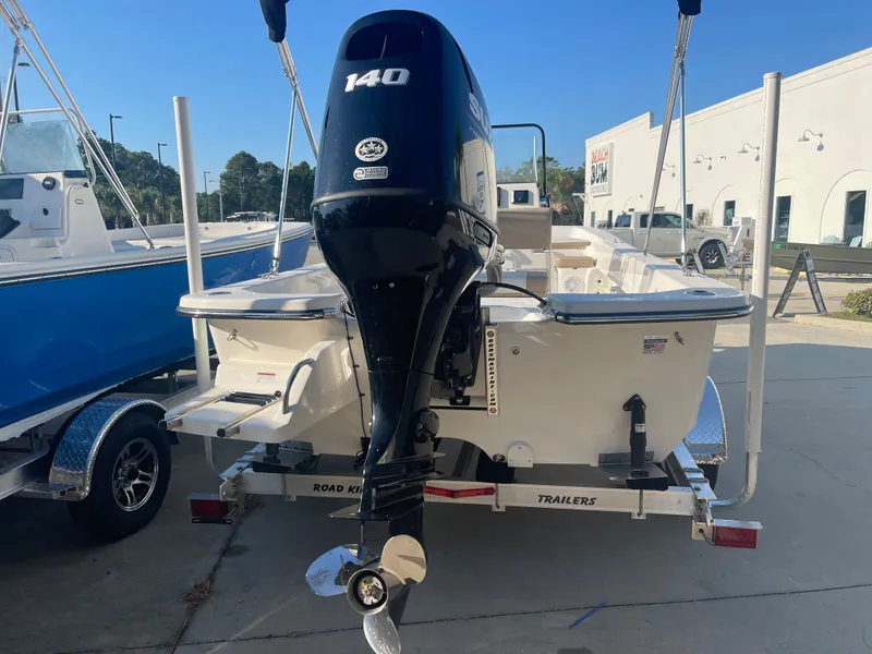 Slide: The Image of 2024 Sundance B20CCR boat with 140 HP engine on trailer. - 2