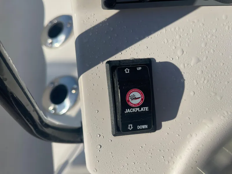 Slide: The Image of Close-up of jackplate control switch on 2024 Sundance B20CCR boat. - 6