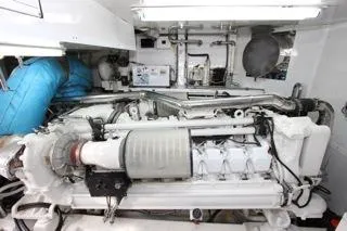 Slide: The Image of 2001 Precision Convertible engine room with detailed machinery and piping. - 23