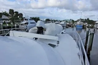 Slide: The Image of 2001 Precision Convertible yacht docked at a marina with other boats. - 3