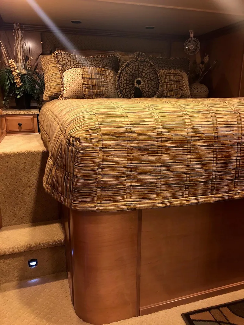 Slide: The Image of Luxurious bedroom interior of 2008 Sumerset Houseboat 20' x 100' with cozy bedding. - 12