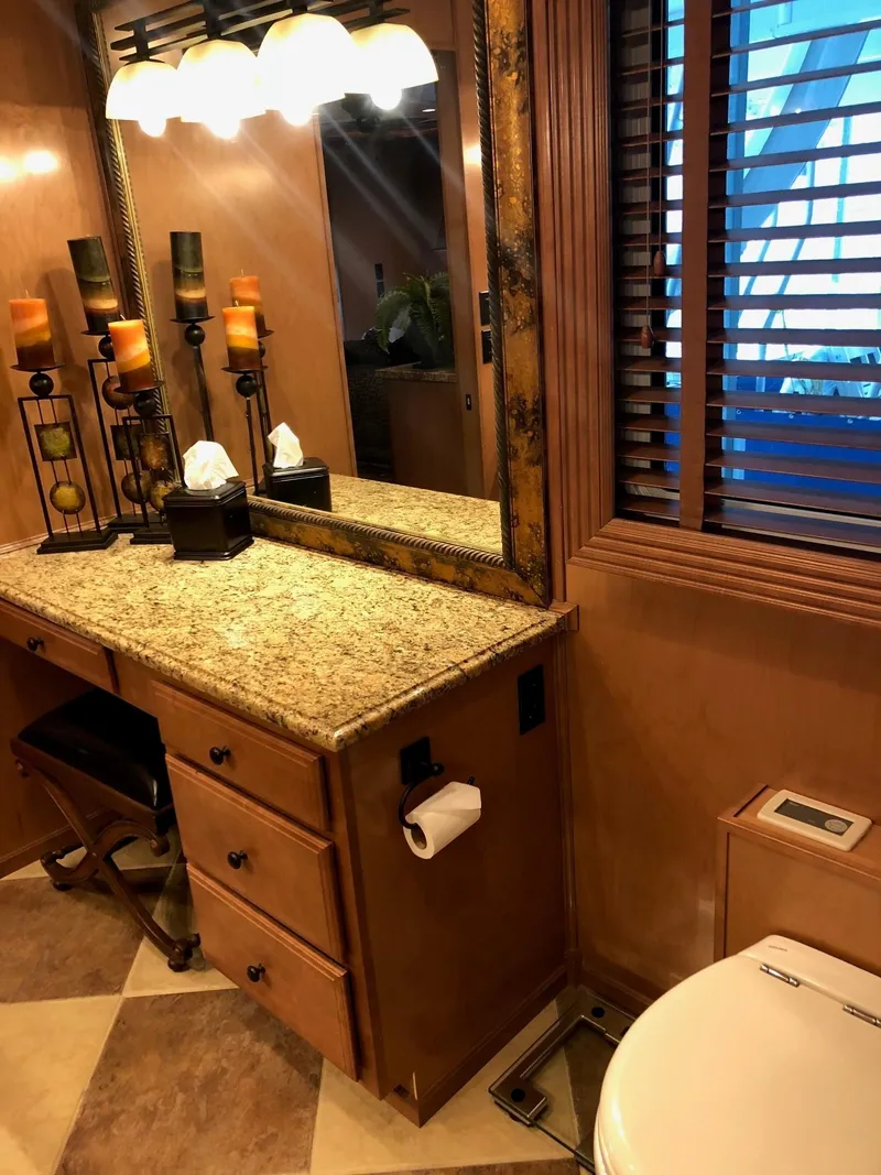 Slide: The Image of Luxurious bathroom in a 2008 Sumerset Houseboat 20' x 100' with granite countertop. - 17