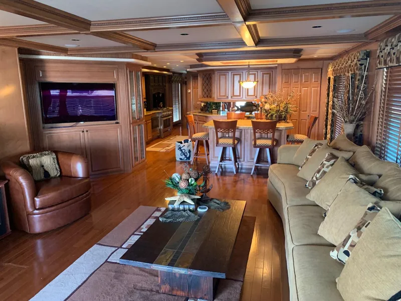 Slide: The Image of Luxurious interior of a 2008 Sumerset Houseboat 20' x 100' with modern furnishings. - 23