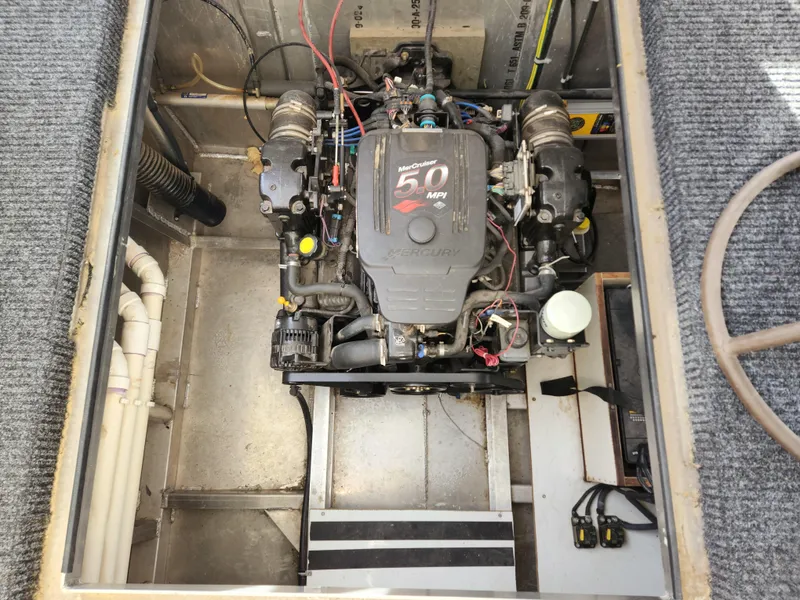 Slide: The Image of Engine compartment of a 2008 Sumerset Houseboat 20' x 100' with a 5.0 MPI engine. - 26