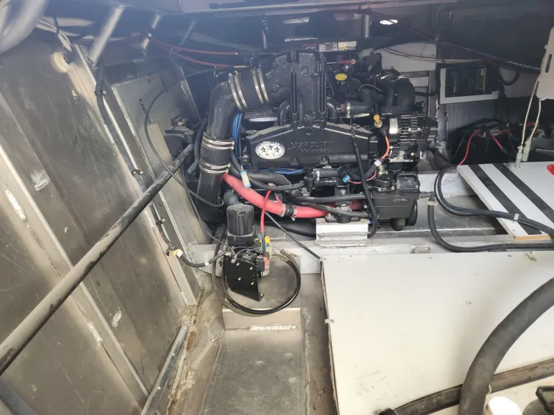 Slide: The Image of Engine room of a 2008 Sumerset Houseboat 20' x 100' with visible machinery. - 30