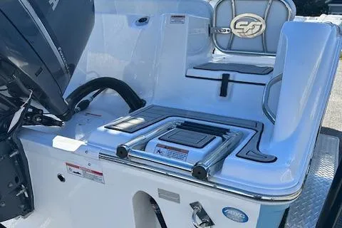 Slide: The Image of 2024 Sea Fox 248 Commander boat stern with motor and seating. - 11