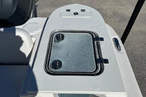 Slide: The Image of 2024 Sea Fox 248 Commander boat deck with storage compartment. - 13