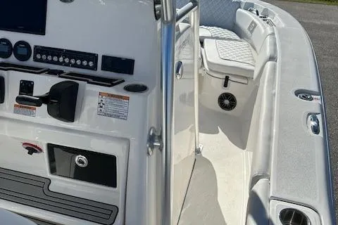 Slide: The Image of 2024 Sea Fox 248 Commander boat interior with helm, seating, and control panel. - 15