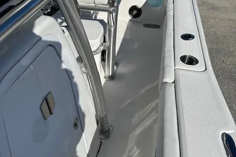 Slide: The Image of 2024 Sea Fox 248 Commander boat interior with seating and storage compartments. - 16