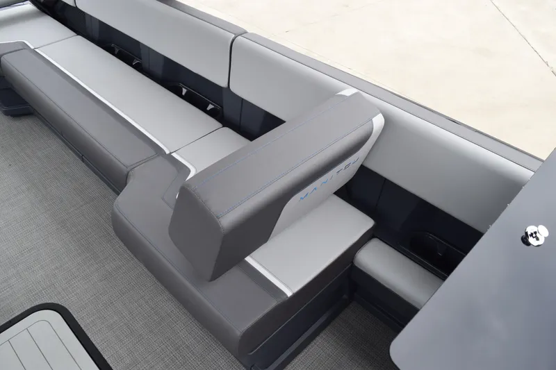 Slide: The Image of 2024 Manitou 22' Cruise Switchback Stealth boat interior seating. - 35