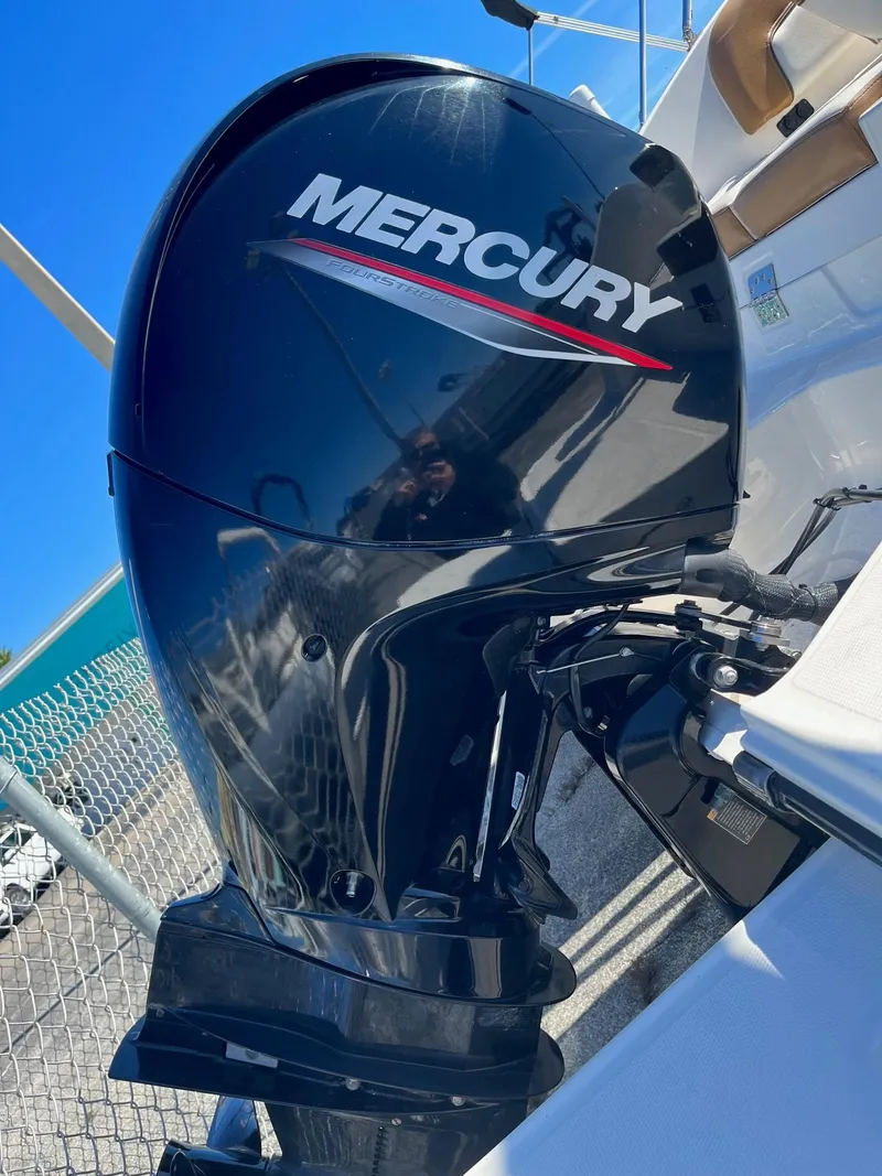 Slide: The Image of Mercury outboard motor on a 2021 Bayliner DX 2200 boat. - 10