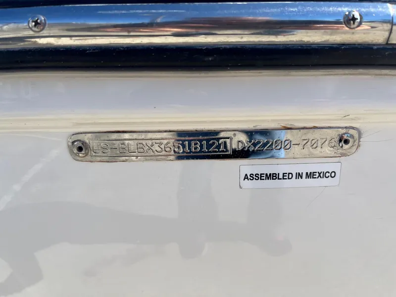 Slide: The Image of 2021 Bayliner DX 2200 boat identification plate, assembled in Mexico. - 11