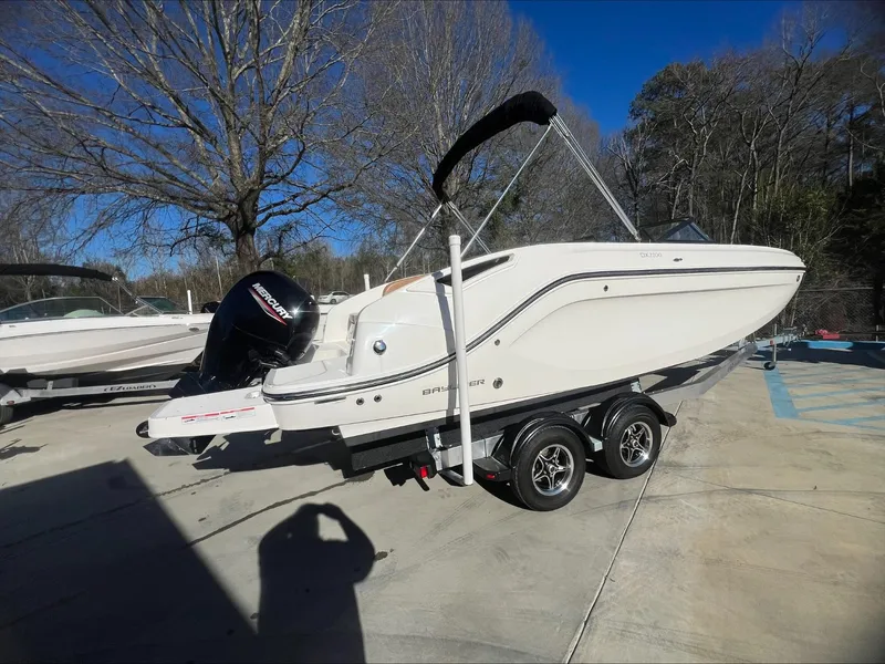 Slide: The Image of 2021 Bayliner DX 2200 boat on trailer, outdoor display. - 6
