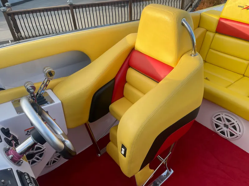 Slide: The Image of 2007 Donzi 38 ZR boat interior with yellow and red seating. - 33