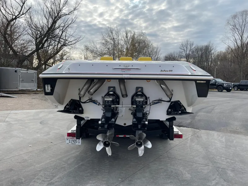 Slide: The Image of 2007 Donzi 38 ZR speedboat rear view with dual outboard motors. - 7
