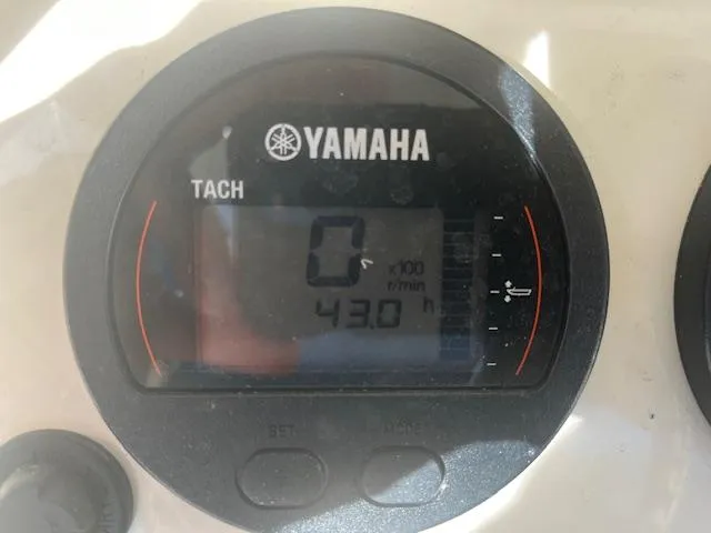 Slide: The Image of Yamaha tachometer on 2023 Scout 215XSF boat showing 43.0 hours. - 7