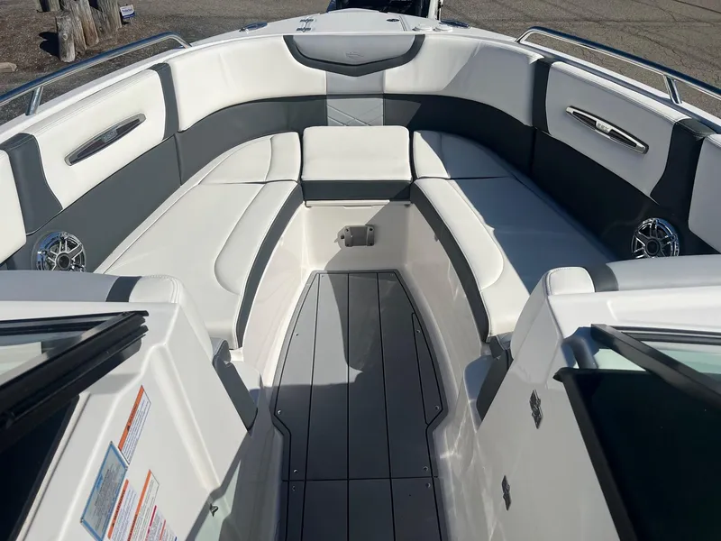 Slide: The Image of 2024 Chaparral 287 SSX boat interior with sleek seating and modern design. - 3