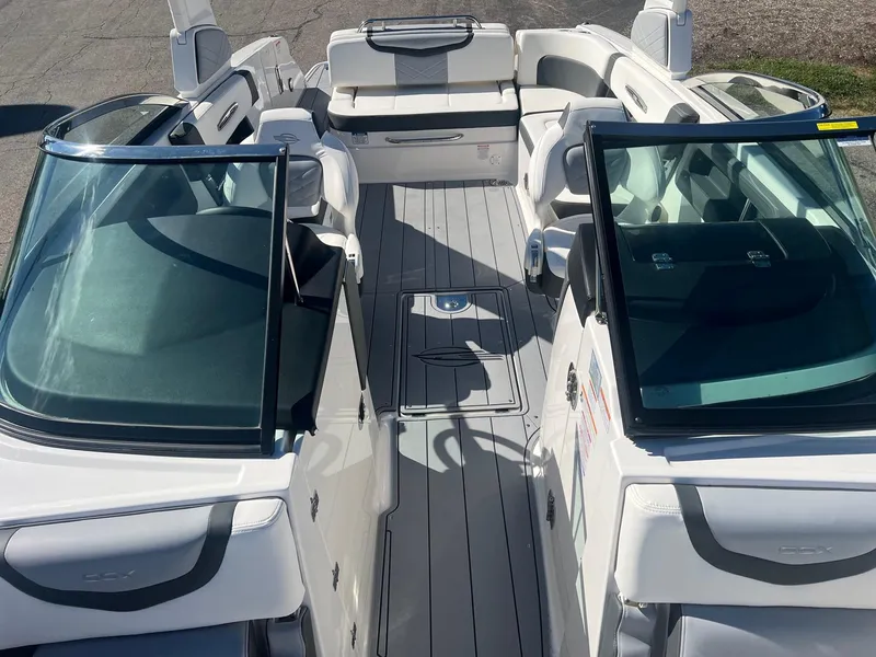 Slide: The Image of 2024 Chaparral 287 SSX boat interior with spacious seating and sleek design. - 4