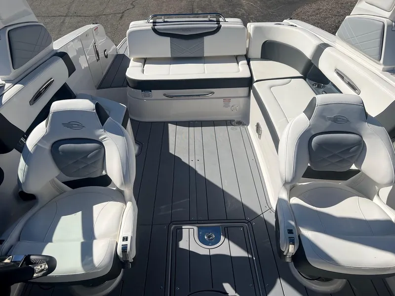 Slide: The Image of 2024 Chaparral 287 SSX boat interior with luxurious seating and modern design. - 5