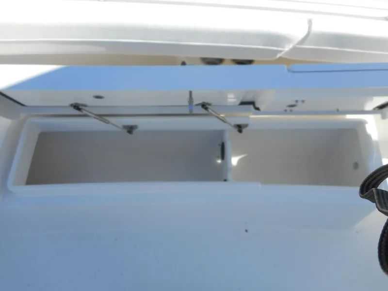 Slide: The Image of Open storage compartment on 2023 Regulator 34 boat. - 12