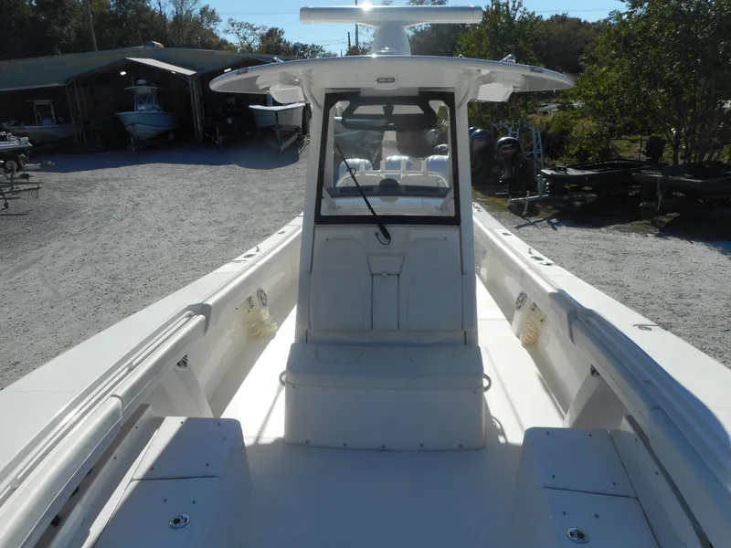 Slide: The Image of 2023 Regulator 34 boat with center console in a boatyard. - 13