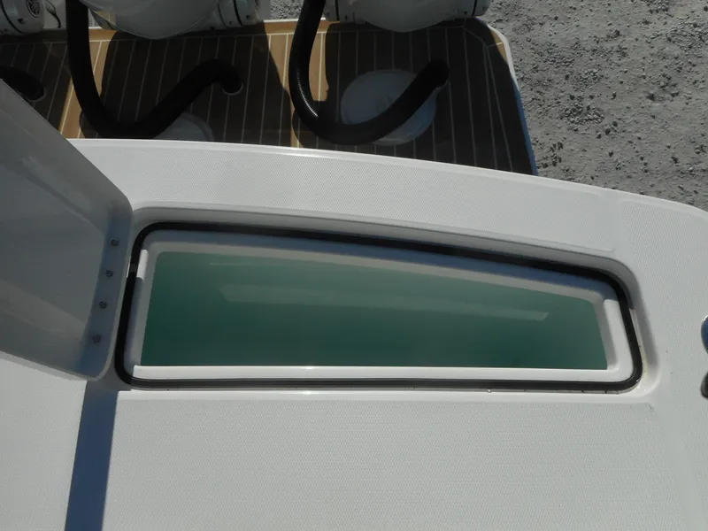 Slide: The Image of 2023 Regulator 34 boat livewell with open lid. - 14