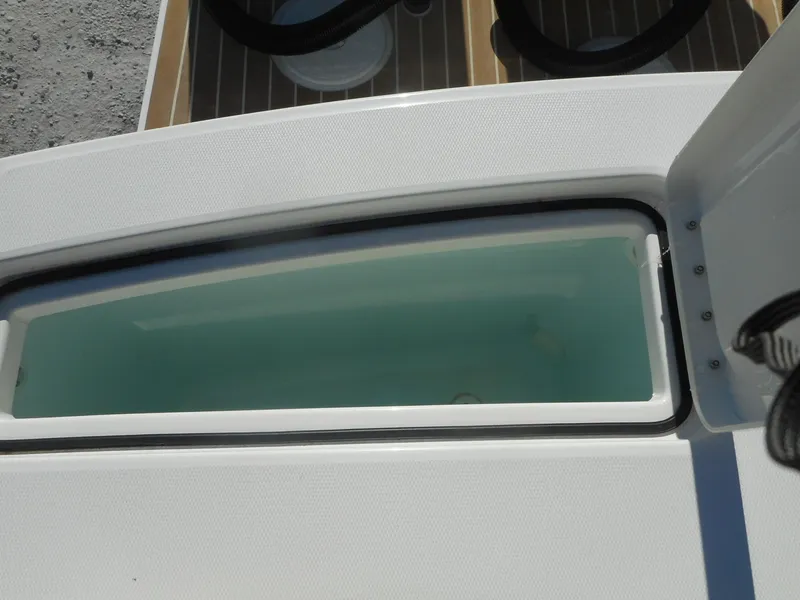 Slide: The Image of Livewell on a 2023 Regulator 34 boat. - 15