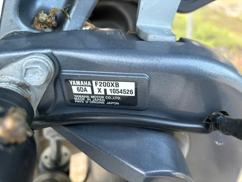 Slide: The Image of Yamaha F200XB engine label on a 2021 KenCraft 21 boat. - 14
