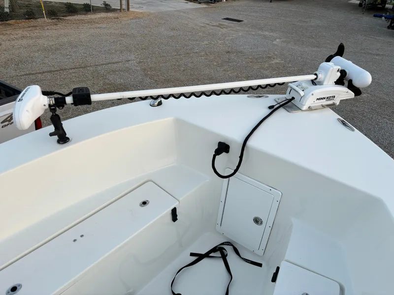 Slide: The Image of KenCraft 21 boat, 2021 model, featuring a Minn Kota trolling motor on the bow. - 27