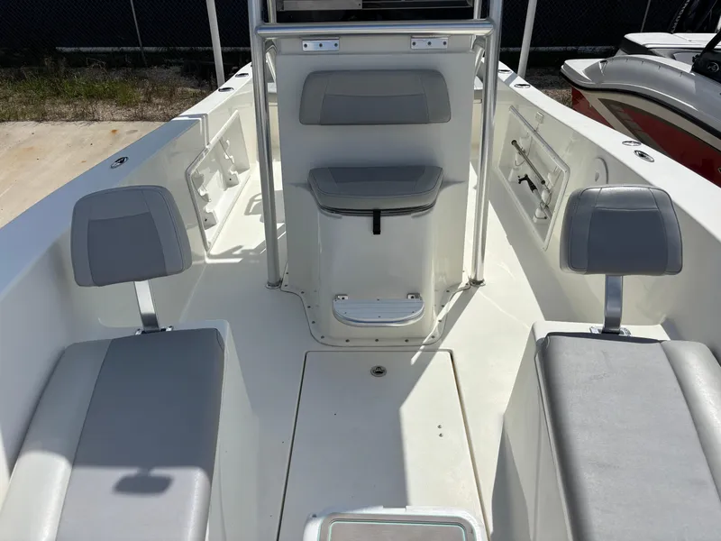 Slide: The Image of 2021 KenCraft 21 boat interior with gray seating and center console. - 3