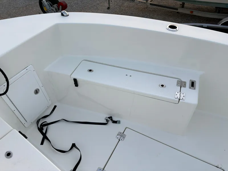 Slide: The Image of KenCraft 21 boat interior, 2021 model, featuring storage compartments and seating area. - 30