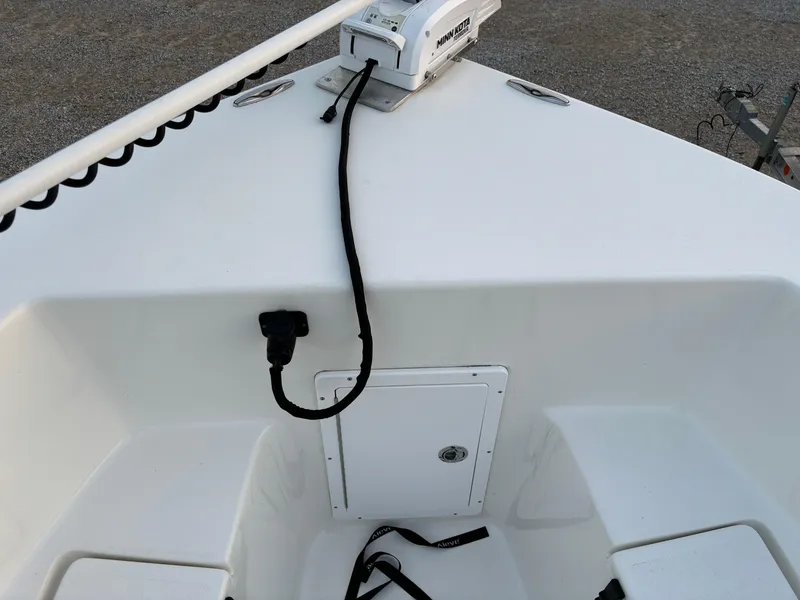 Slide: The Image of KenCraft 21 boat bow with anchor system, 2021 model, featuring storage compartment and clean deck design. - 31