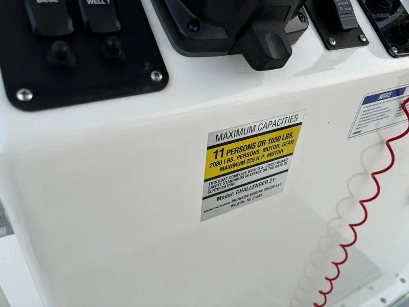 Slide: The Image of KenCraft 21 boat capacity label, 2021 model, showing maximum capacity of 11 persons or 1620 lbs. - 38