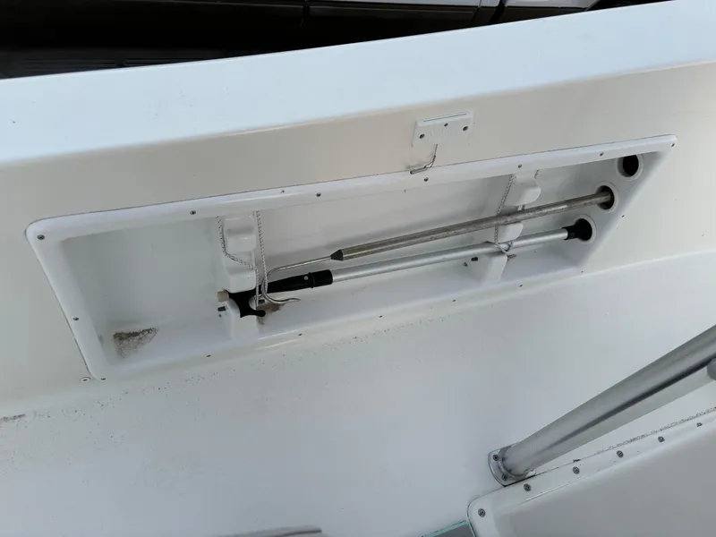 Slide: The Image of KenCraft 21 boat interior detail, 2021 model, featuring storage compartment and metal fixtures. - 45