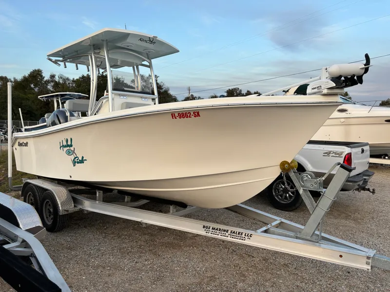 Slide: The Image of 2021 KenCraft 21 boat on trailer, parked outdoors, side view. - 9