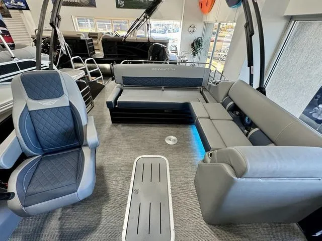 Slide: The Image of 2024 Bennington 25 LTSB boat interior with modern seating and ambient lighting. - 20