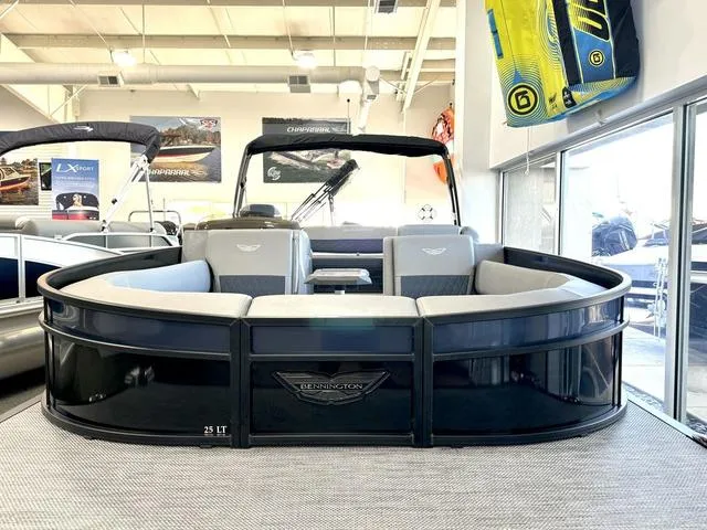 Slide: The Image of Interior seating of 2024 Bennington 25 LTSB pontoon boat with protective cover. - 3
