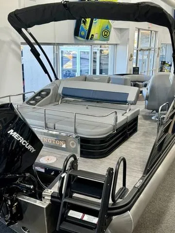 Slide: The Image of 2024 Bennington 25 LTSB boat interior with spacious seating and modern design. - 30