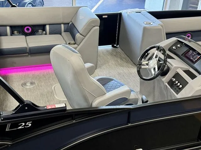 Slide: The Image of 2024 Bennington 25 LTSB pontoon boat under construction in a factory. - 7