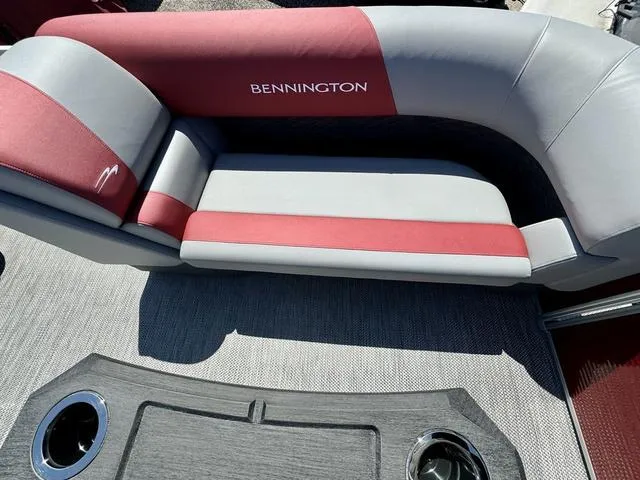 Slide: The Image of 2024 Bennington 20 SSB boat interior with red and gray seating - 14