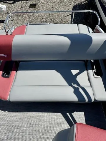 Slide: The Image of 2024 Bennington 20 SSB boat with gray and red seating. - 15