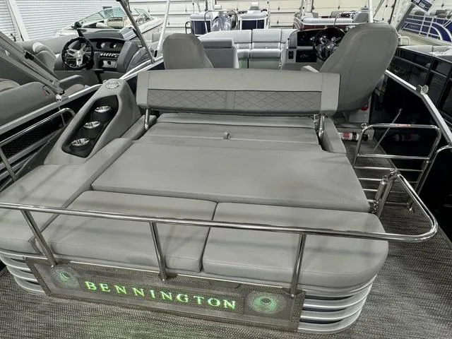Slide: The Image of 2024 Bennington 23 LSB pontoon boat interior with plush seating and modern design. - 38