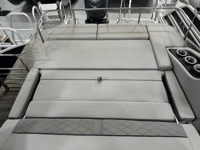 Slide: The Image of 2024 Bennington 23 LSB boat with spacious seating and cup holders. - 41