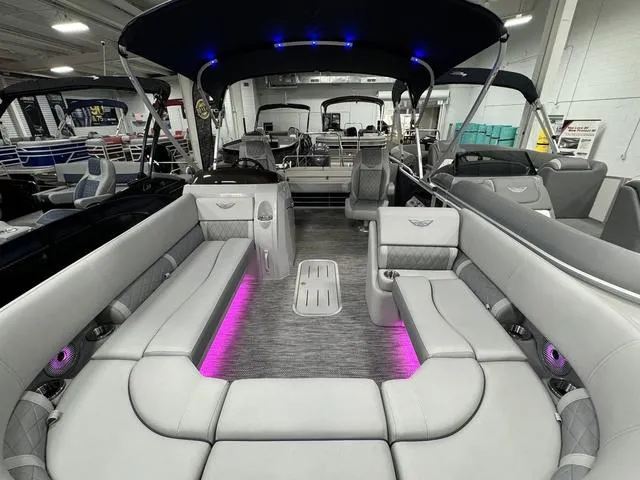Slide: The Image of 2024 Bennington 23 LSB pontoon boat with luxurious seating and ambient lighting. - 44