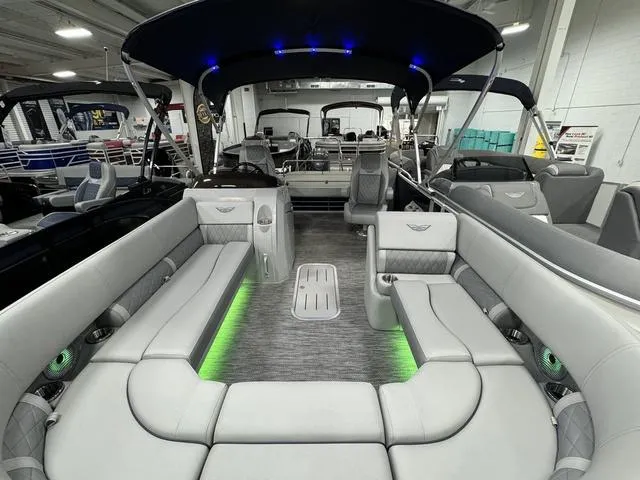 Slide: The Image of 2024 Bennington 23 LSB pontoon boat with luxurious seating and ambient lighting. - 45