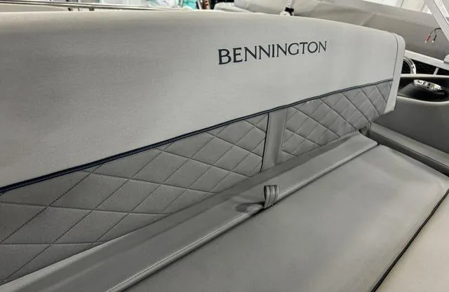 Slide: The Image of 2024 Bennington 23 LSB boat interior with gray quilted seating. - 47