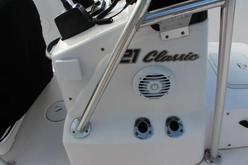 Slide: The Image of 2014 Pro-Line 21 CC Classic boat console with speaker and controls. - 16
