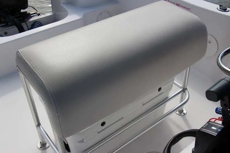Slide: The Image of 2014 Pro-Line 21 CC boat with cushioned bench seat and storage. - 21