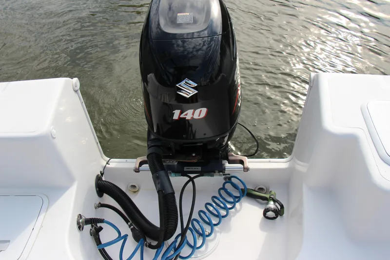 Slide: The Image of 2014 Pro-Line 21 CC boat with Suzuki 140 outboard motor. - 9